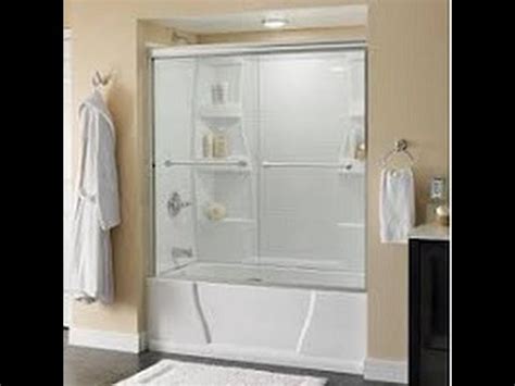 Deltashowerdoors.com installation video - Shop Delta EverEdge Shower Door Brushed Nickel 56-in to 60-in x 71.1418-in Frameless Sliding Shower Door in the Shower Doors department at Lowe's.com. The EverEdge shower door draws on the precision and crisp forms of modern architecture. Clean lines, slim vertical handles, and plenty of transparency lend a
